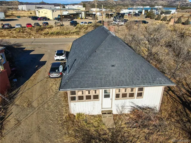 a view of a house with roof deck