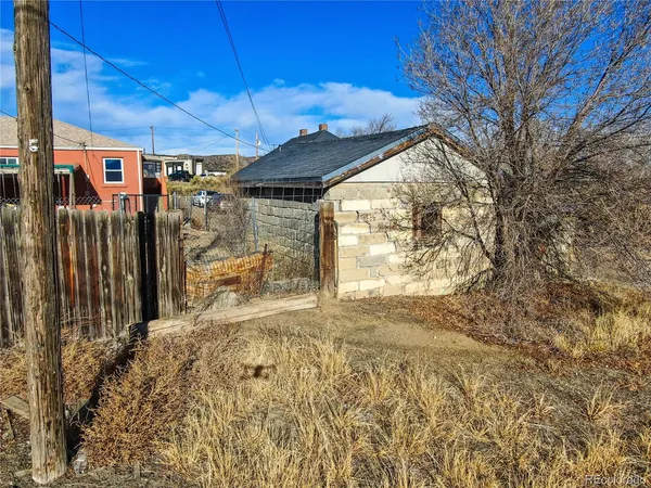 a view of a yard with an outdoor space