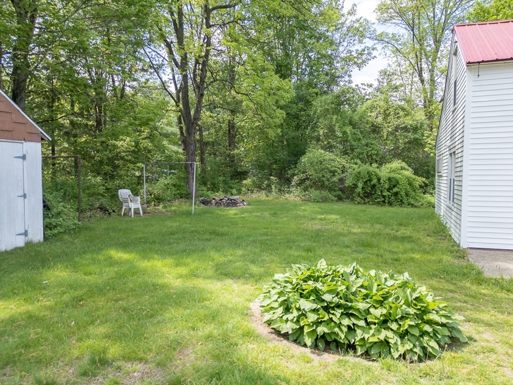 92 Squannacook Road Shirley, MA 01464 - Photo 29 of 38 a view of a garden with a fountain
