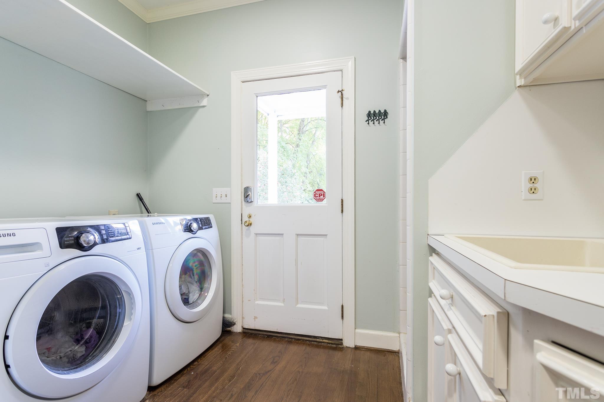 2505 Winterbury Court Raleigh, NC 27607 - Photo 14 of 24 a utility room with dryer and washer