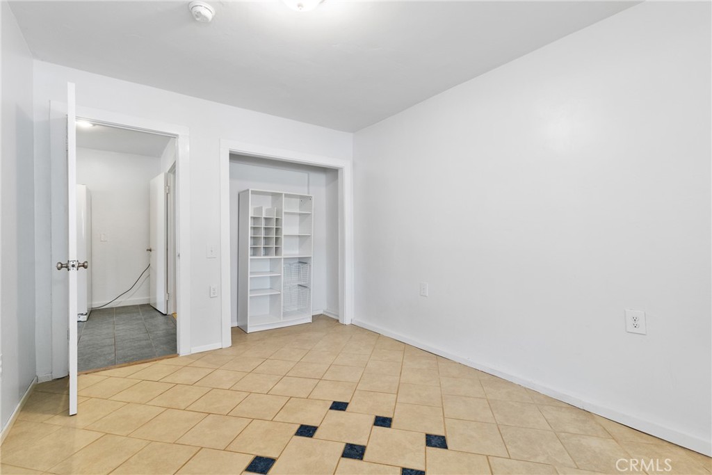 7990 San Gabriel Road Atascadero, CA 93422 - Photo 15 of 69 Bedroom 4 has tile floors and a window seat with built-in seating.