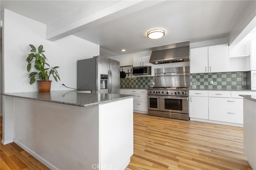 7990 San Gabriel Road Atascadero, CA 93422 - Photo 28 of 69 a kitchen with stainless steel appliances a refrigerator sink and stove