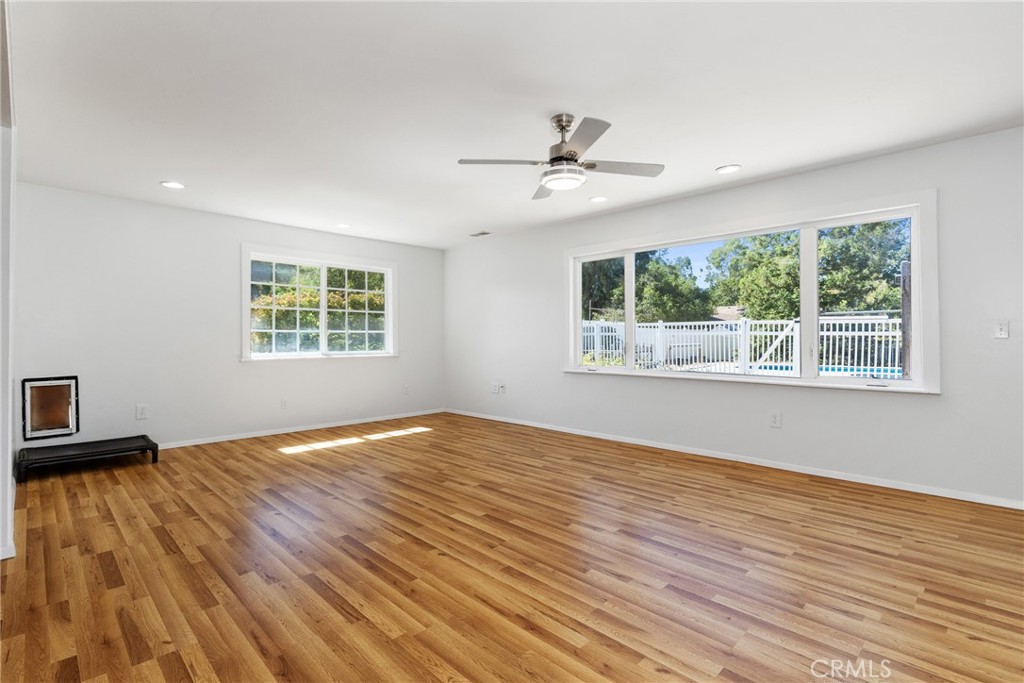 7990 San Gabriel Road Atascadero, CA 93422 - Photo 33 of 69 a view of an empty room with wooden floor and a window