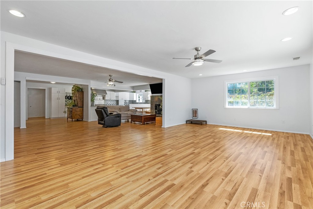 7990 San Gabriel Road Atascadero, CA 93422 - Photo 34 of 69 The laminate wood floors extend seamlessly throughout the home, creating a sense of continuity.