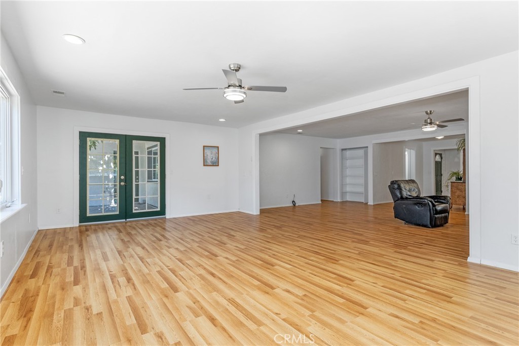 7990 San Gabriel Road Atascadero, CA 93422 - Photo 35 of 69 a view of a bedroom with a bed and dresser with wooden floor
