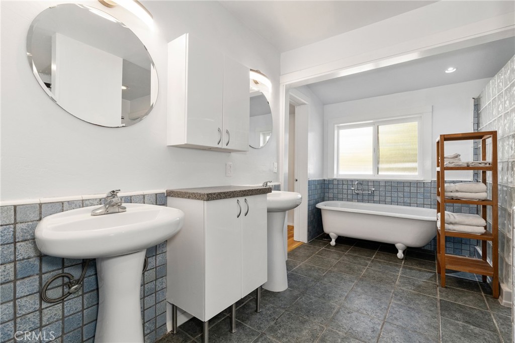 7990 San Gabriel Road Atascadero, CA 93422 - Photo 43 of 69 a bathroom with a sink and a mirror