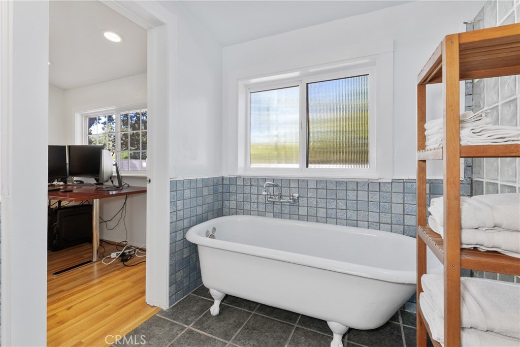 7990 San Gabriel Road Atascadero, CA 93422 - Photo 46 of 69 a white bath tub sitting next to a window