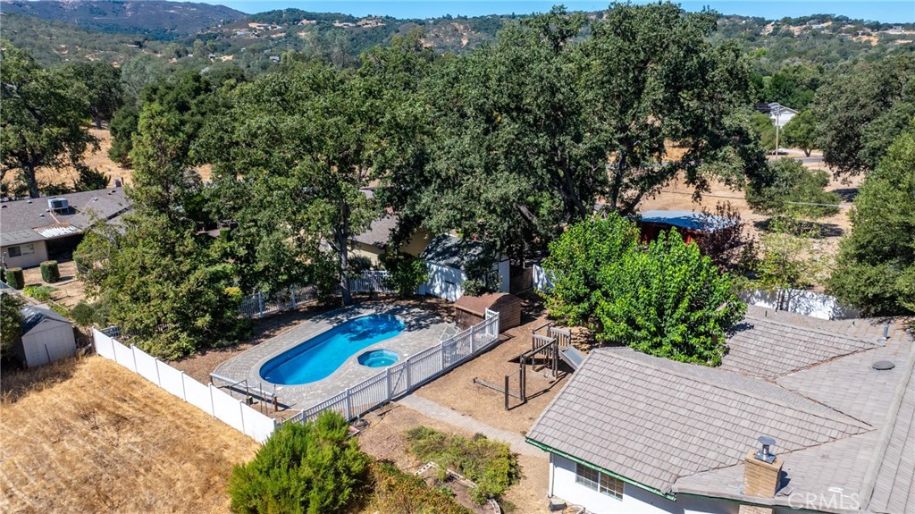 7990 San Gabriel Road Atascadero, CA 93422 - Photo 49 of 69 an aerial view of a house with swimming pool and mountains