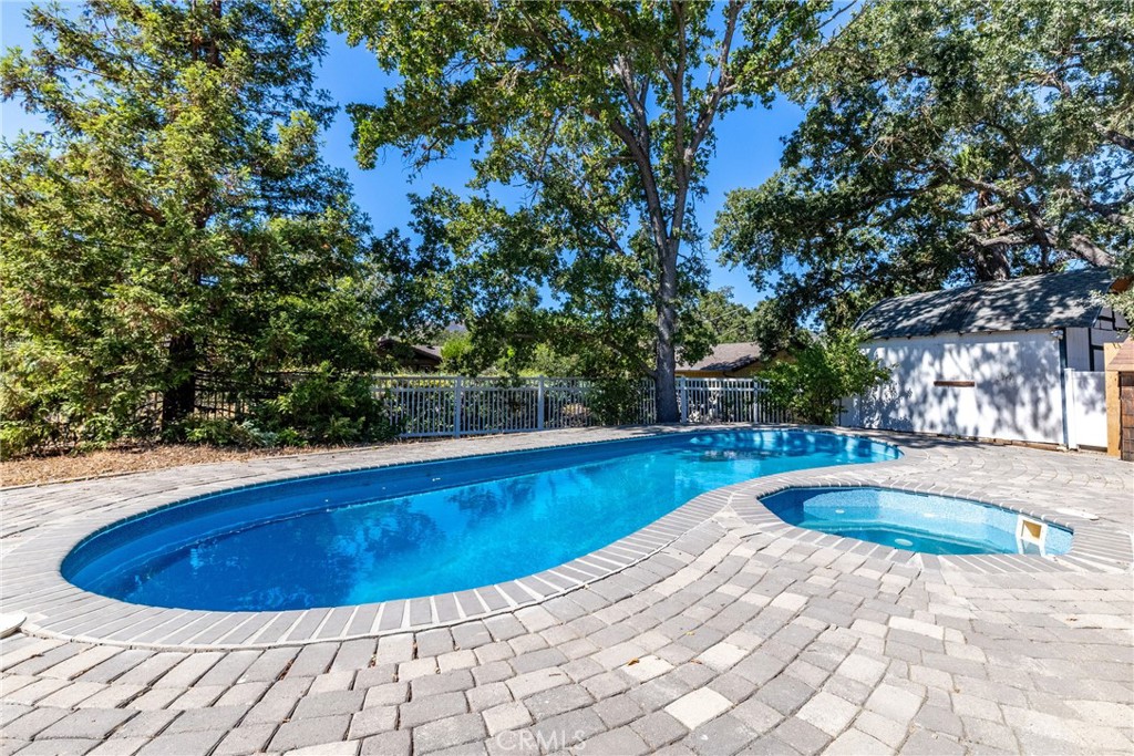 7990 San Gabriel Road Atascadero, CA 93422 - Photo 60 of 69 Surrounded by a wonderful brick paver patio which gives you space for patio furniture, loungers and hanging out.