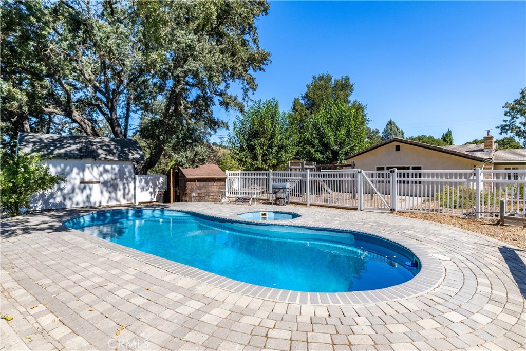 7990 San Gabriel Road Atascadero, CA 93422 - Photo 61 of 69 a view of a swimming pool with lounge chair
