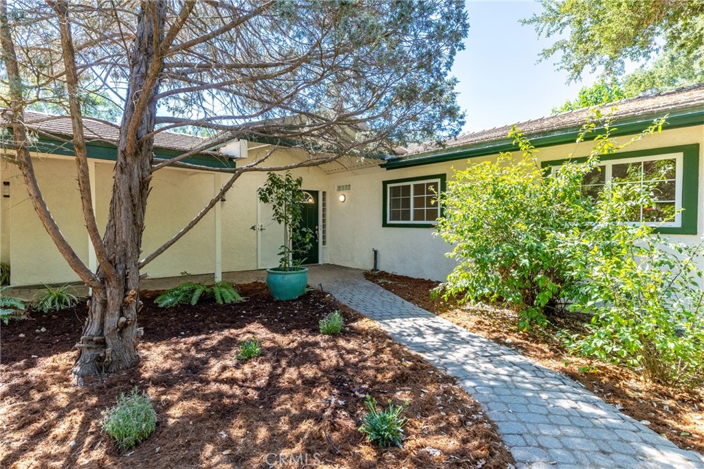 7990 San Gabriel Road Atascadero, CA 93422 - Photo 8 of 69 a front view of a house with garden