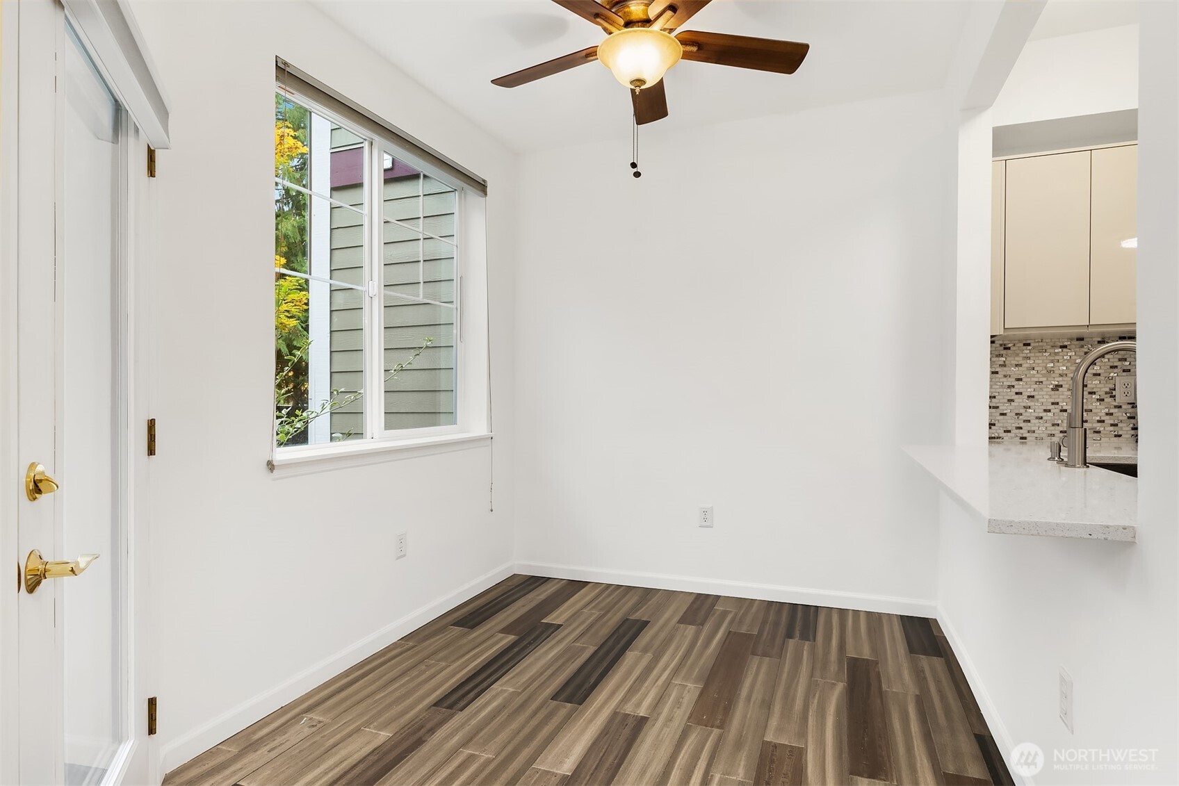 13000 Admiralty Way, Unit L104 Everett, WA 98204 - Photo 6 of 21 an empty room with windows