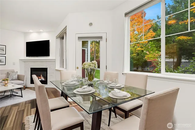 a view of a dining room with furniture window and outside view