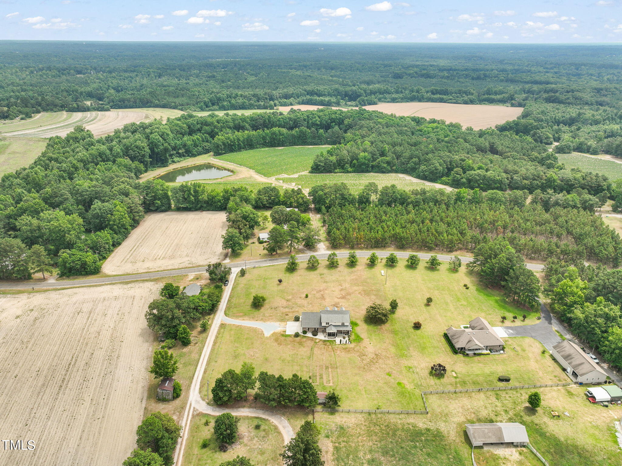 2674 Stanton Hill Road Cameron, NC 28326 - Photo 60 of 64 a view of a lake with a yard