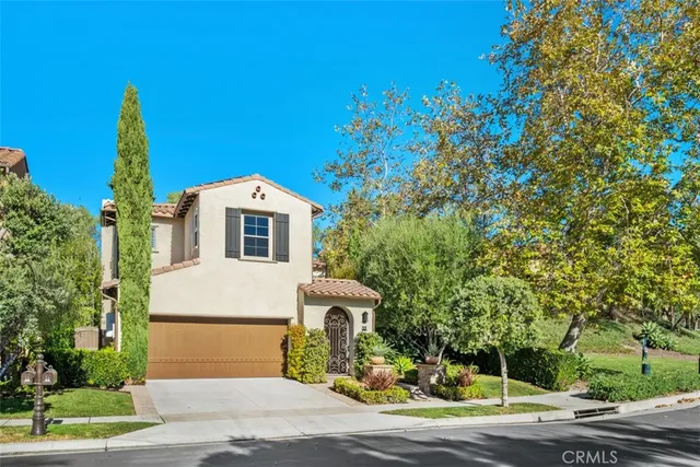 a house view with a garden space