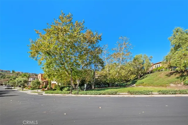 a view of a street with a building in the background