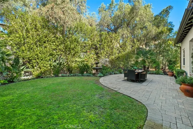 a view of a outdoor space with a patio and garden