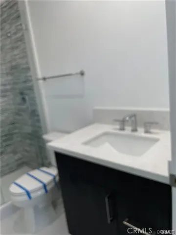 a bathroom with a sink and a toilet