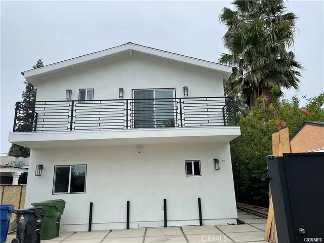 a front view of a house with balcony