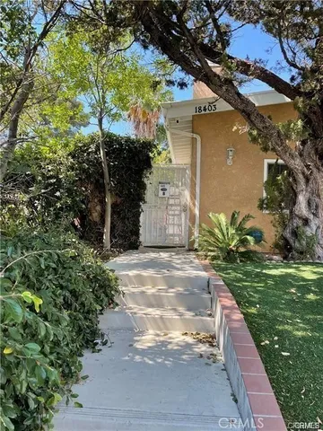 a view of a back yard of the house