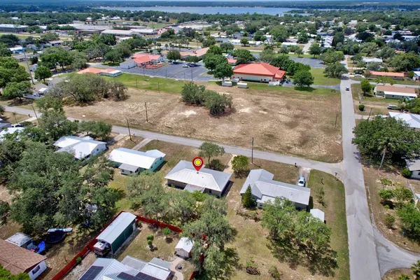 an aerial view of a houses with outdoor space