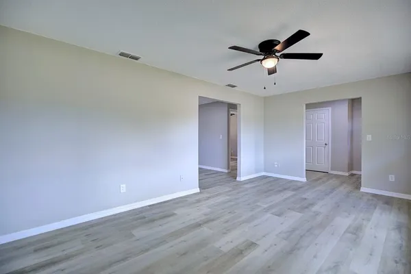 a view of an empty room and window