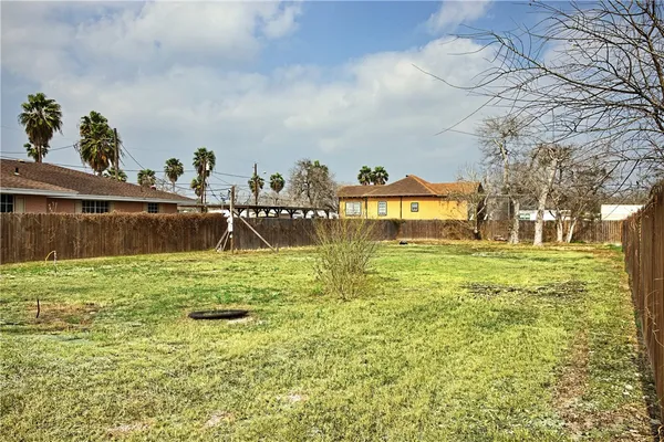 a view of a swimming pool with a garden