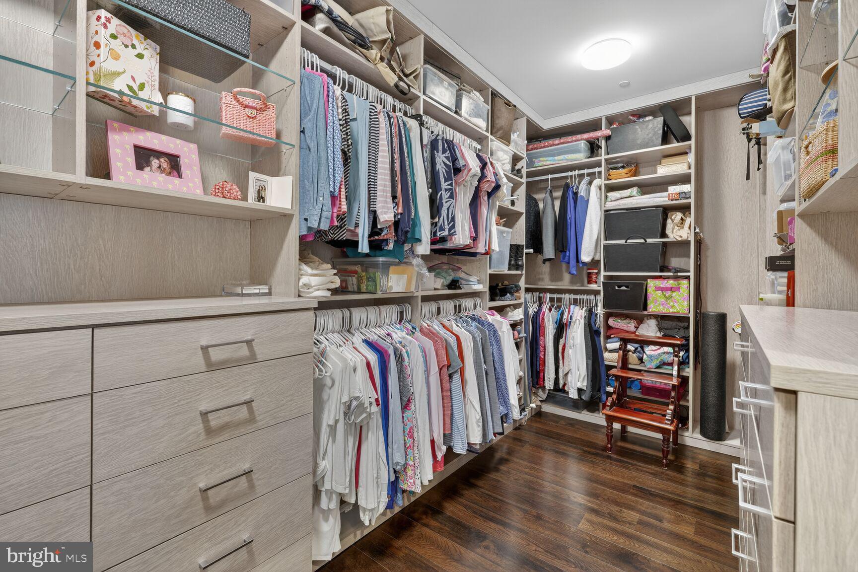 6900 Fleetwood Road, Unit 612 McLean, VA 22101 - Photo 25 of 42 a view of walk in closet with clothes and shoes