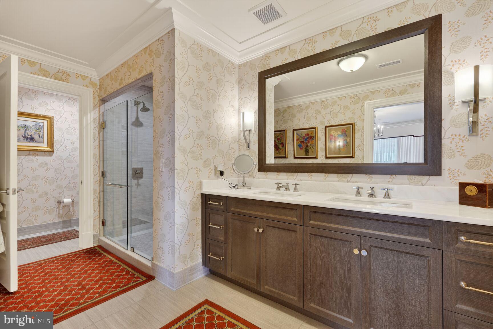 6900 Fleetwood Road, Unit 612 McLean, VA 22101 - Photo 26 of 42 a bathroom with a sink a toilet and shower