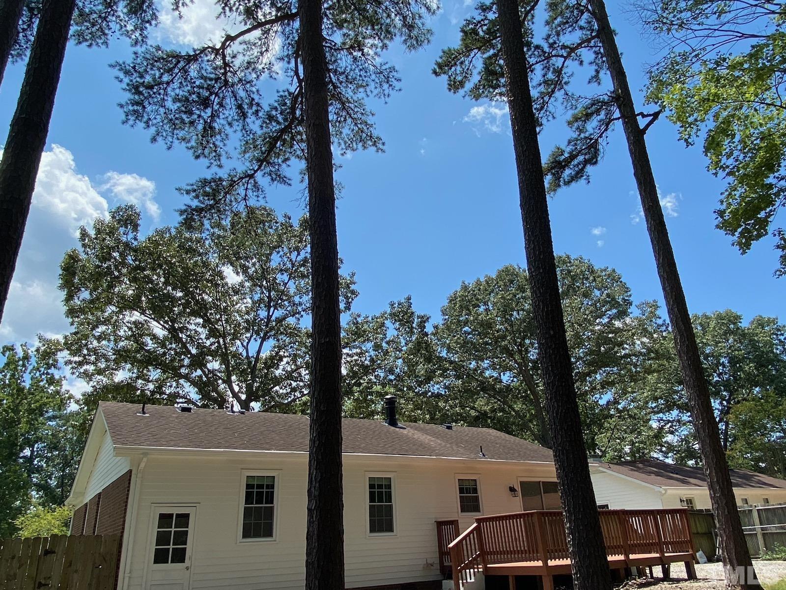 708 Sawmill Road Raleigh, NC 27615 - Photo 29 of 32 a view of house with outdoor space and trees