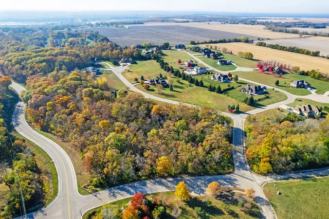an aerial view of multiple house with outdoor space