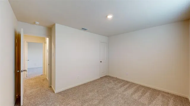 a bathroom with a sink toilet vanity and bathtub