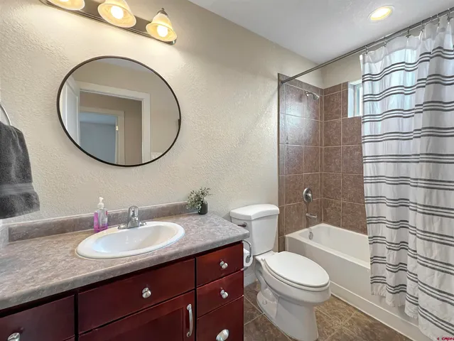 a view of a backyard of the house