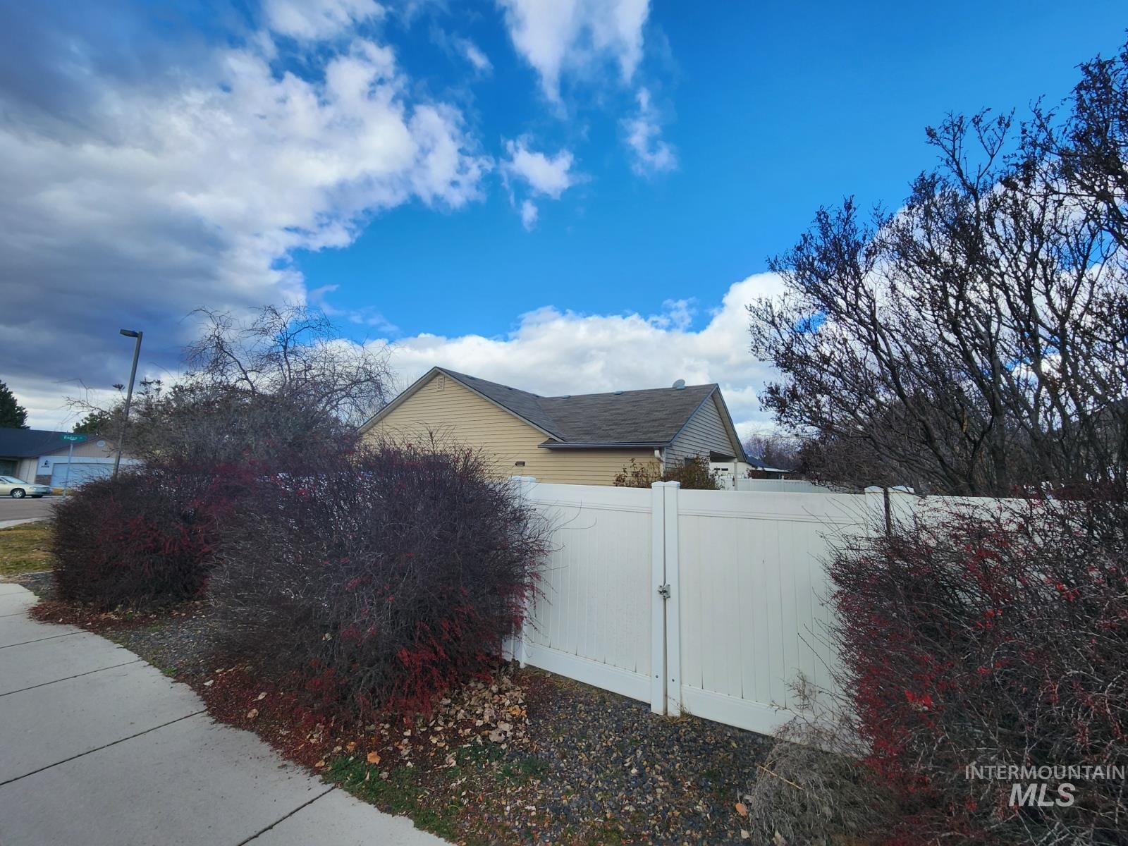 1000 North Rodeo Street Parma, ID 83660 - Photo 33 of 33 View of home's exterior with a gate