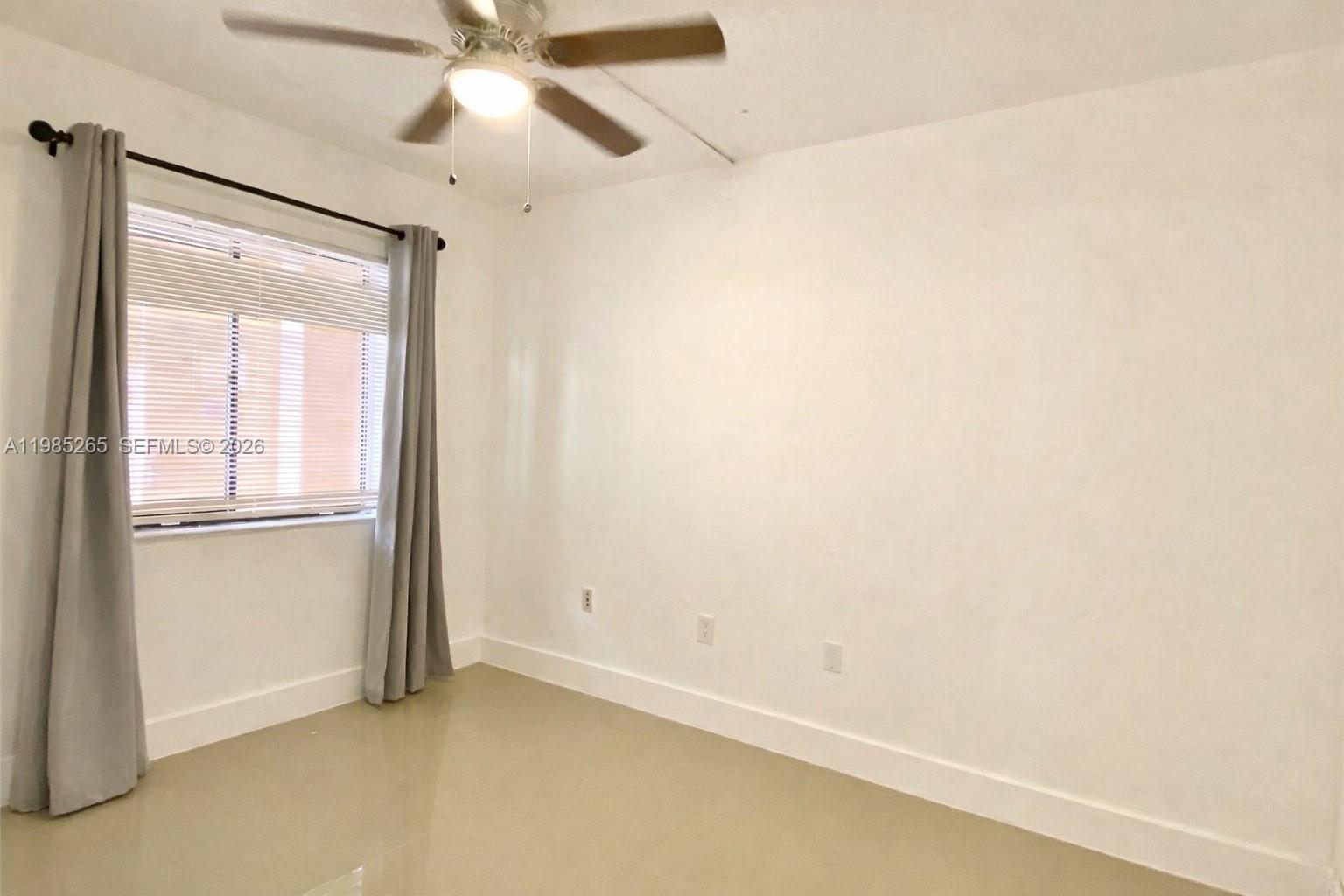 8520 Southwest 133rd Avenue Road, Unit 112 Miami, FL 33183 - Photo 4 of 11 a view of an empty room