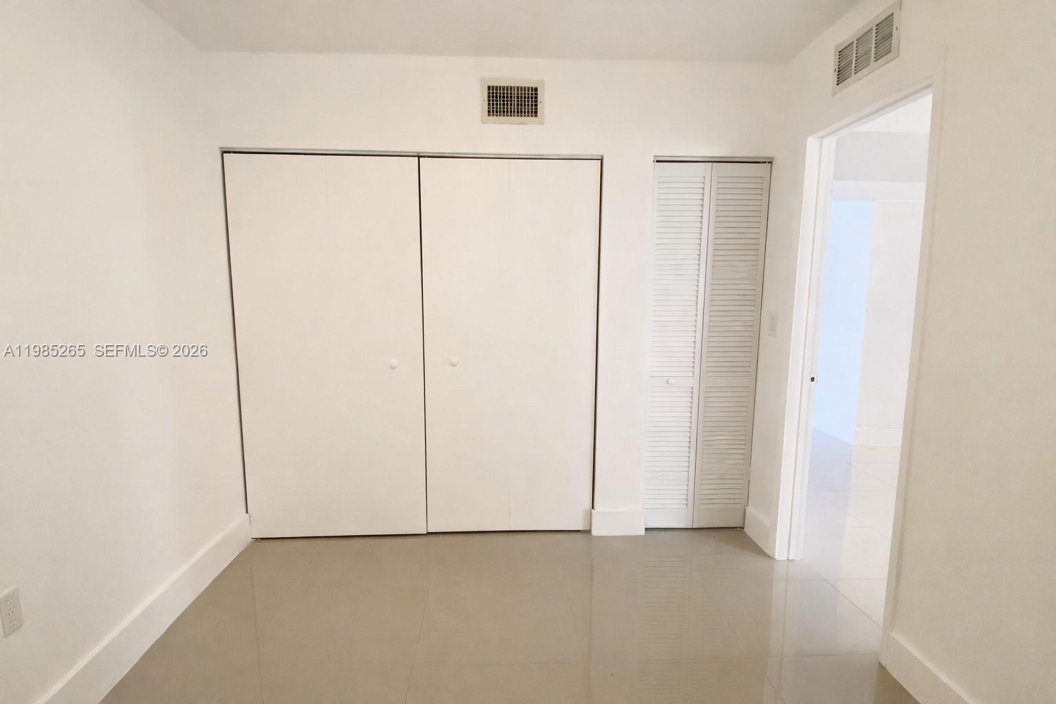 8520 Southwest 133rd Avenue Road, Unit 112 Miami, FL 33183 - Photo 5 of 11 a view of an empty room