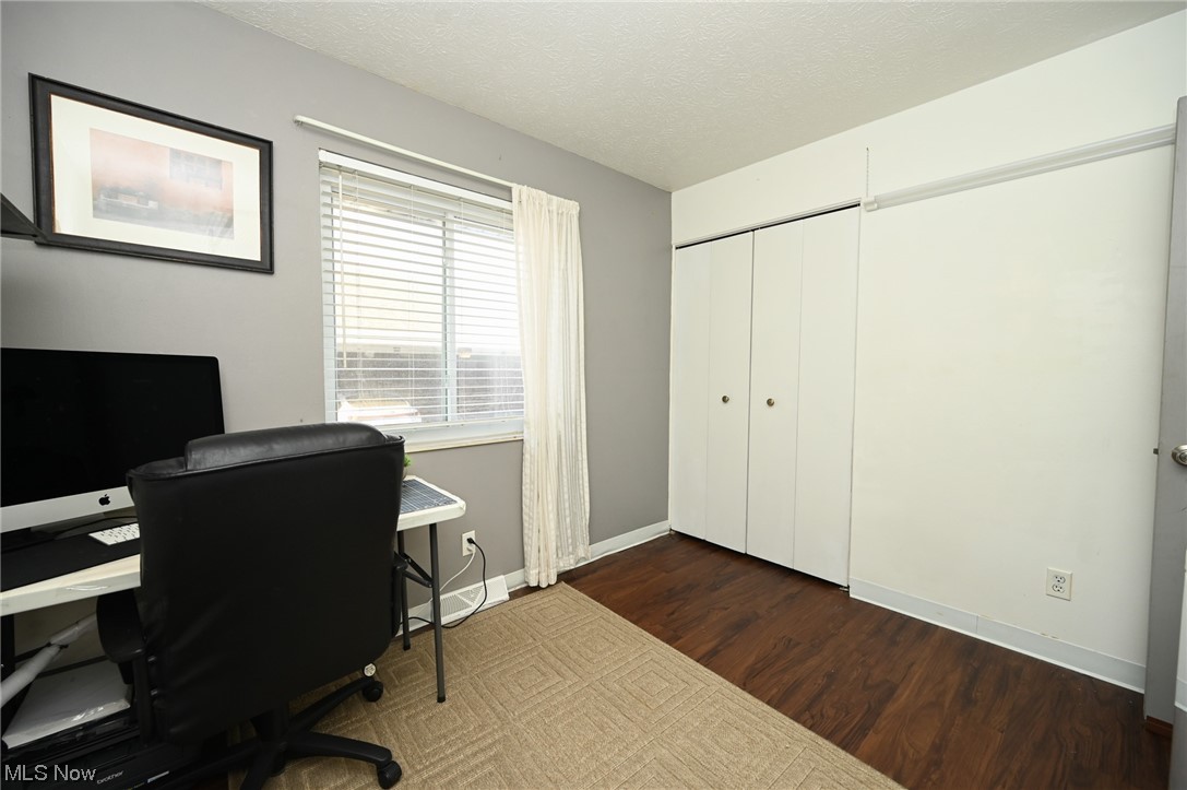 5651 Broadview Road, Unit C9 Cleveland, OH 44134 - Photo 22 of 29 Home office with dark wood-type flooring