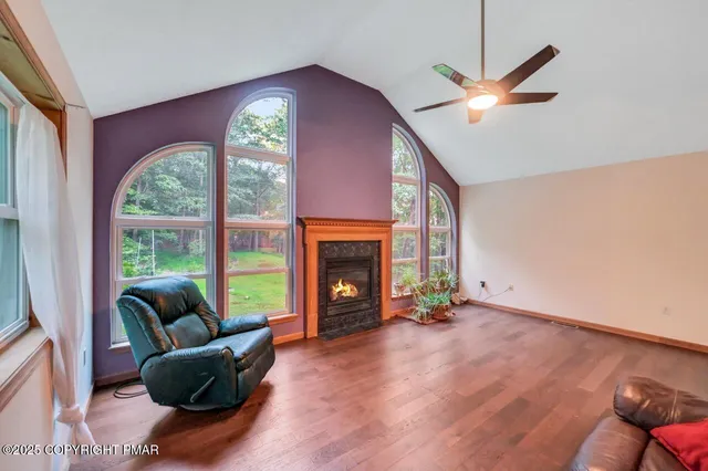 a kitchen with stainless steel appliances granite countertop a refrigerator stove top oven a sink and dishwasher