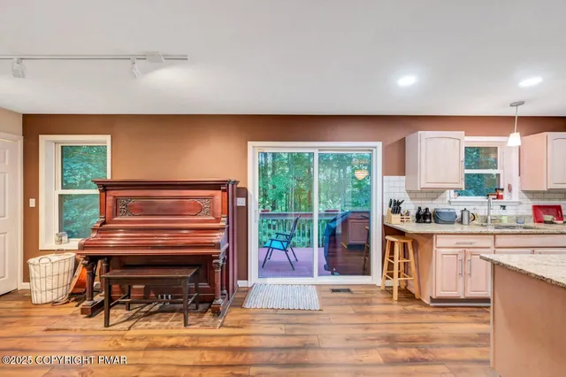 a view of a room with a furniture and staircase