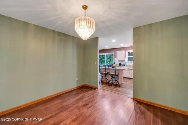 a bathroom with a double vanity sink and mirror