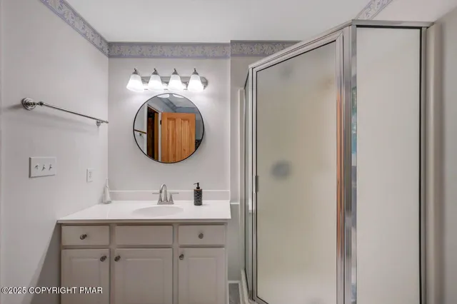 a backyard of a house with lots of green space and fountain