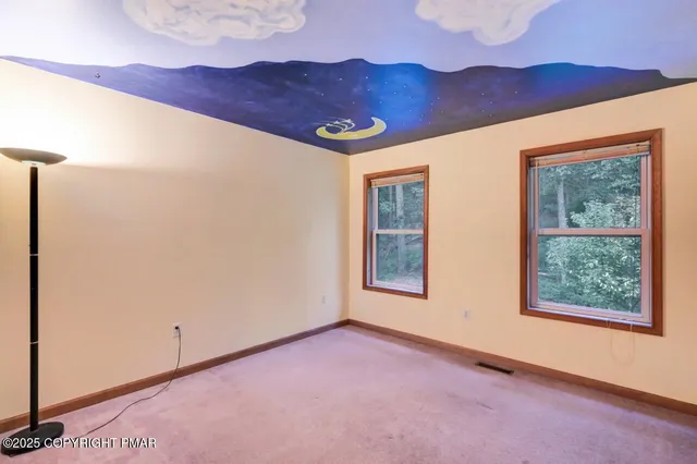 a view of a back yard of the house