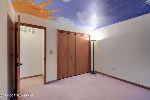 a view of a house with a yard porch and sitting area