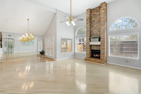 a view of a dining room with furniture and window