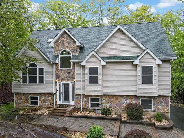a view of a yard in front of a house