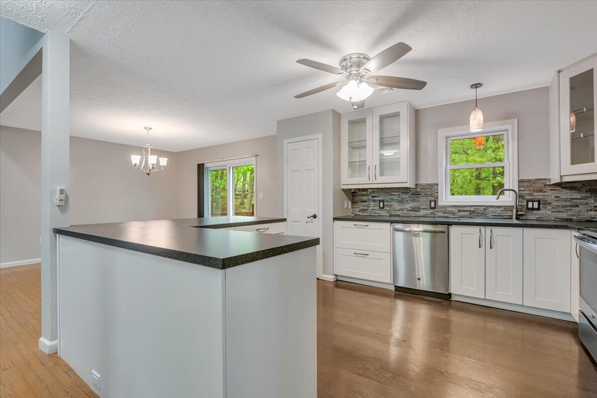 2330 Burntwood Drive East Stroudsburg, PA 18301 - Photo 12 of 44 a kitchen with granite countertop a sink cabinets and window
