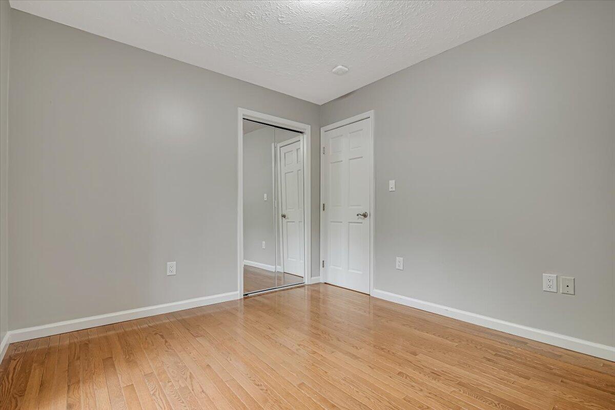 2330 Burntwood Drive East Stroudsburg, PA 18301 - Photo 17 of 44 a view of an empty room with wooden floor