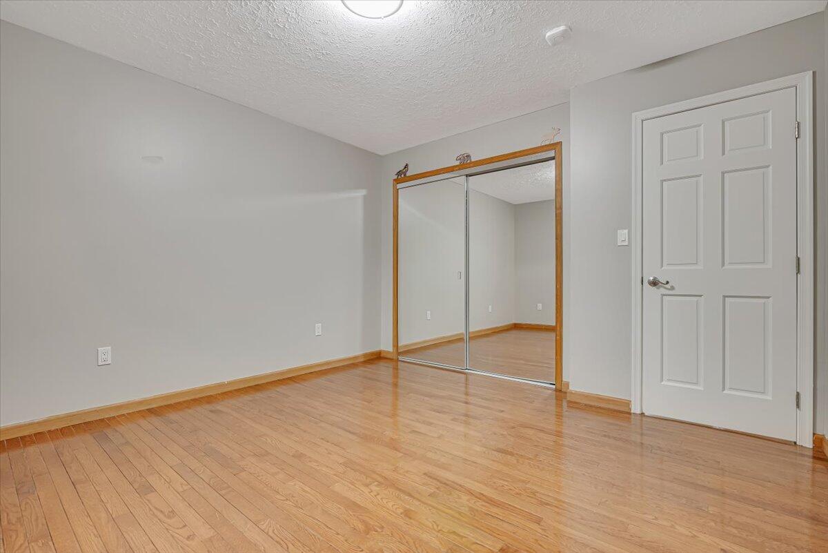 2330 Burntwood Drive East Stroudsburg, PA 18301 - Photo 18 of 44 an empty room with wooden floor and closet area