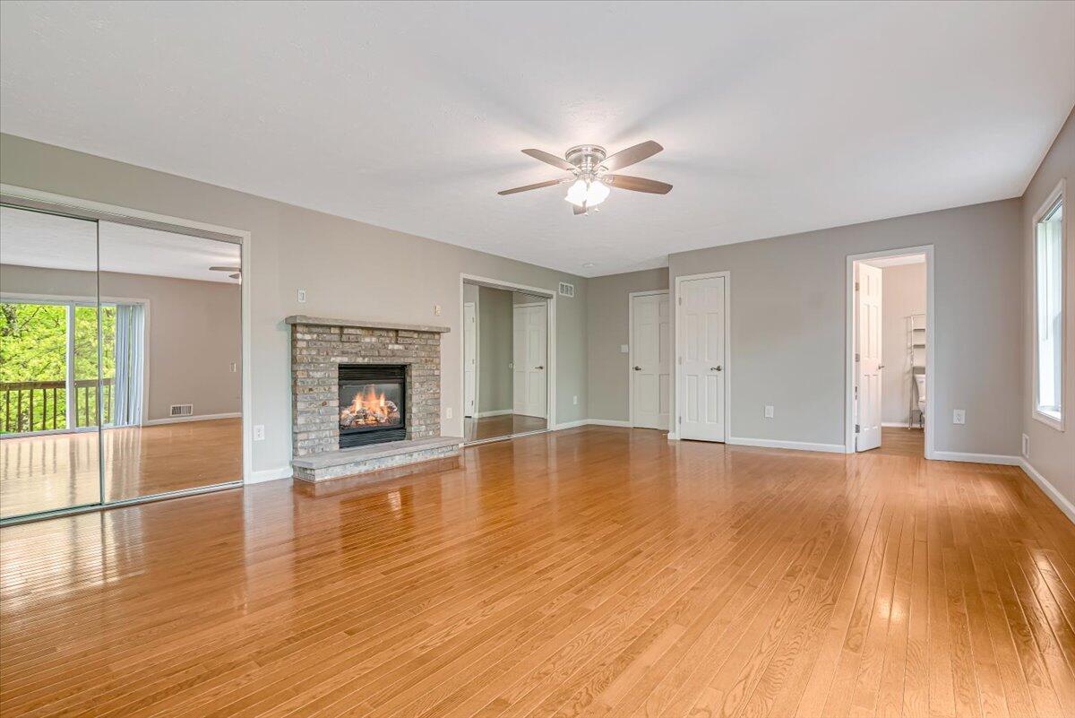 2330 Burntwood Drive East Stroudsburg, PA 18301 - Photo 27 of 44 a view of empty room with wooden floor and fan