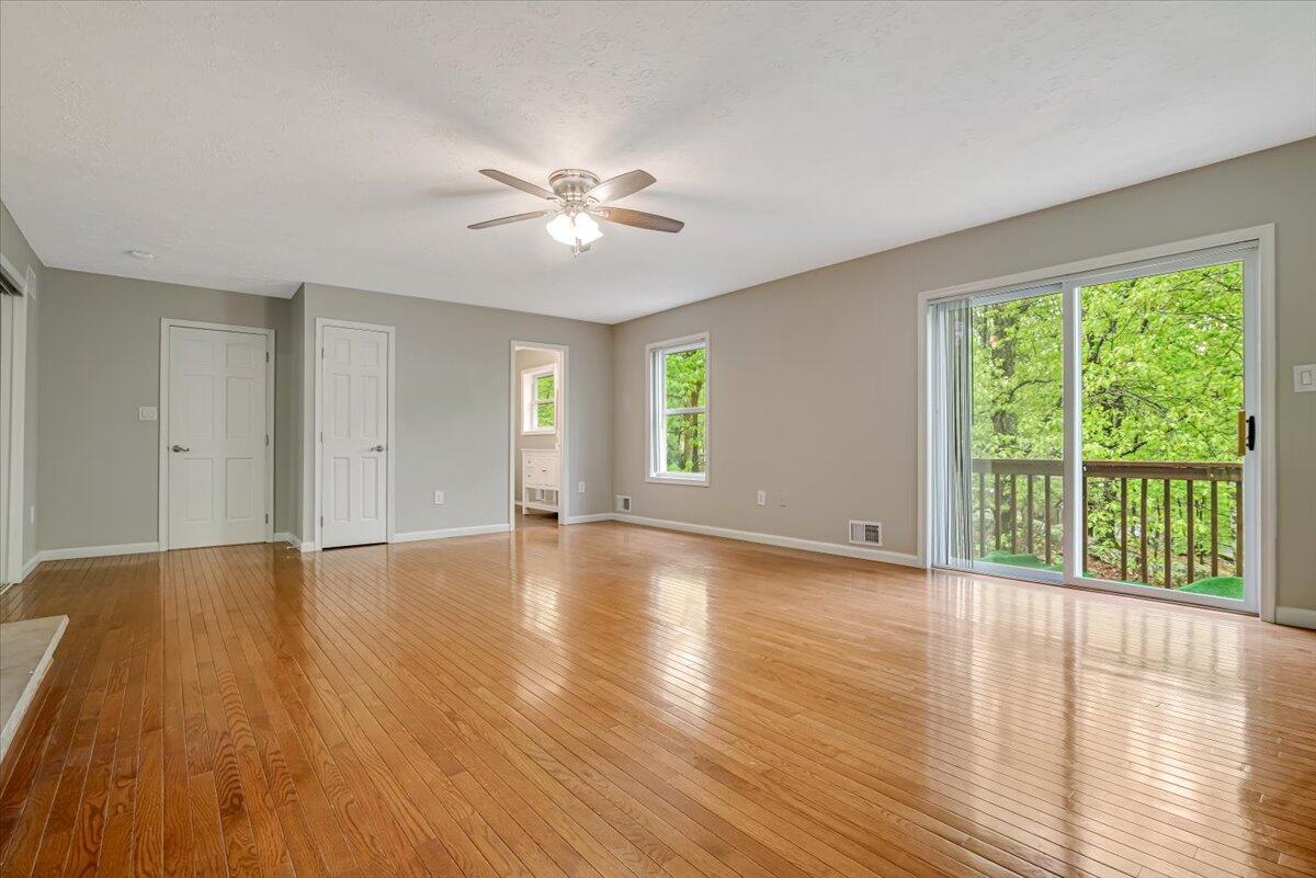 2330 Burntwood Drive East Stroudsburg, PA 18301 - Photo 28 of 44 a view of an empty room with wooden floor and a window